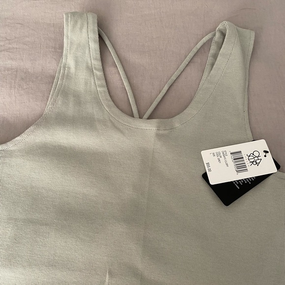 Stylish athletic top.  NWT - Picture 2 of 3